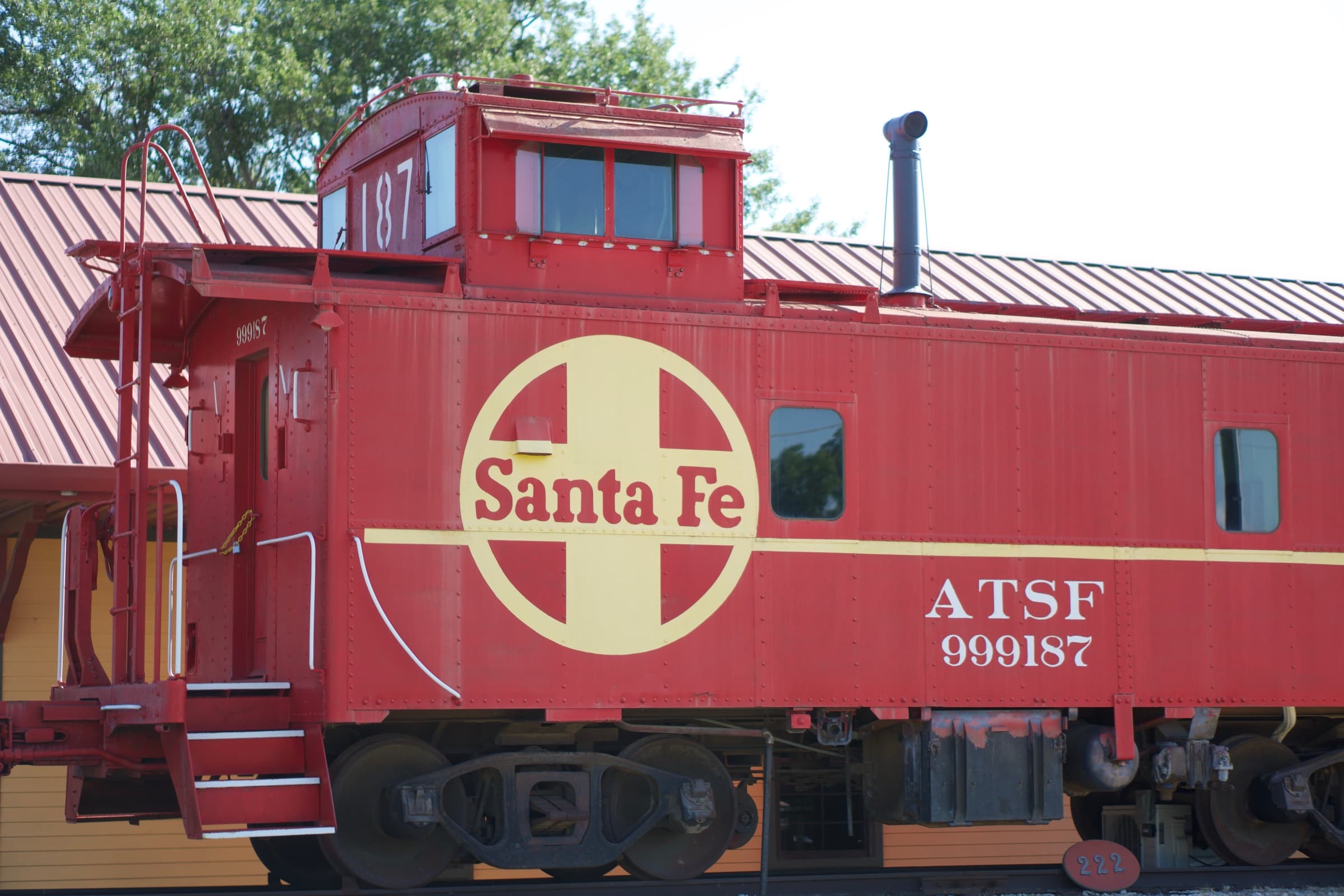 The real, walk-in Santa Fe caboose outside the museum
